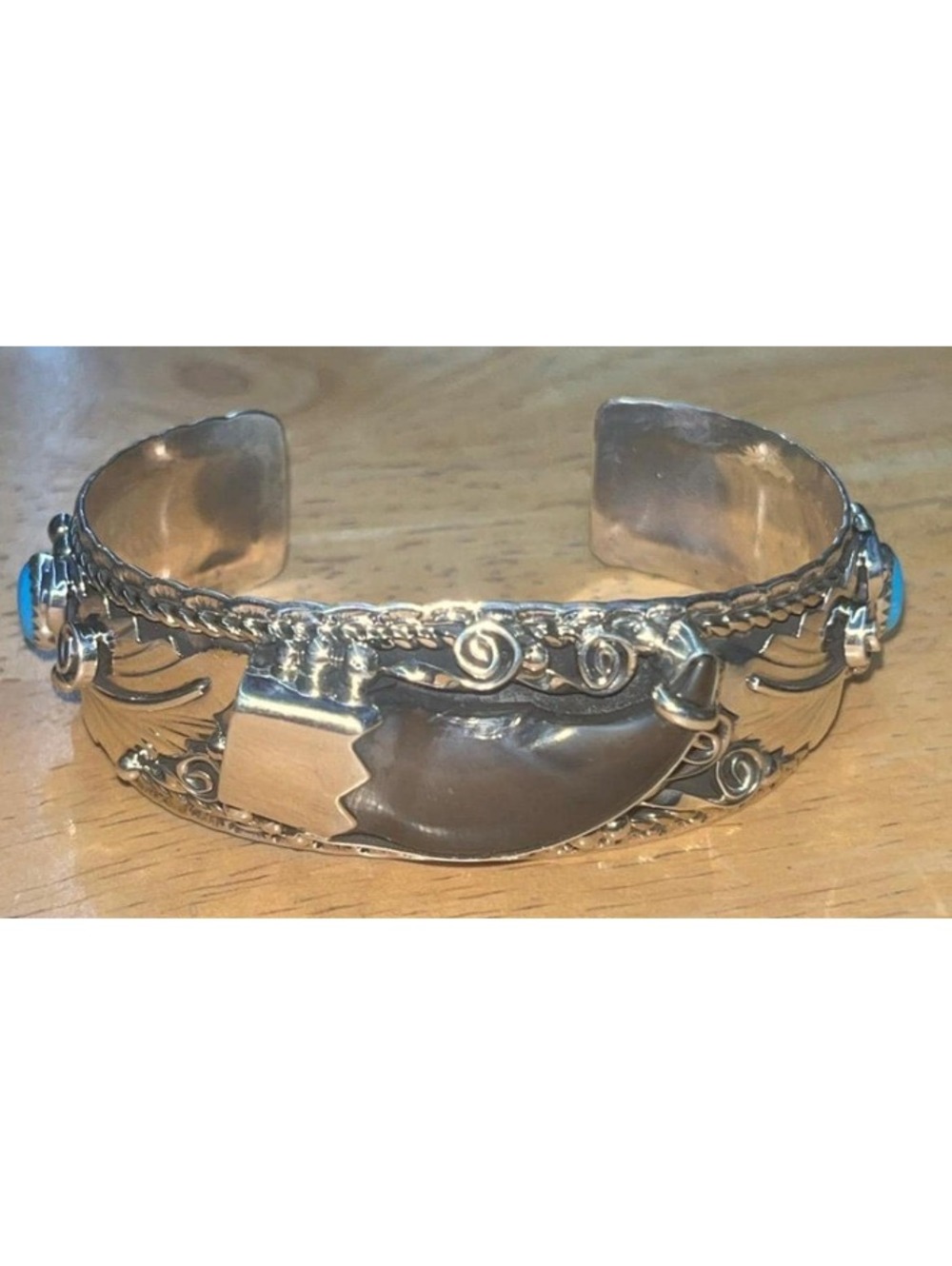 Navajo sterling silver turquoise and coral bear traditional bracelet cuff
